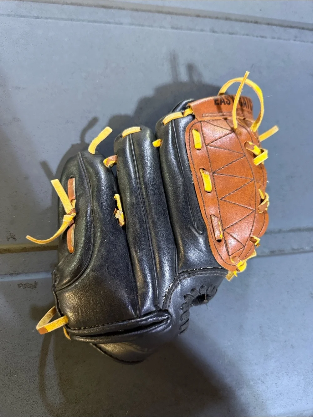 Wilson Kids Black and Tan Baseball Glove with Yellow Laces